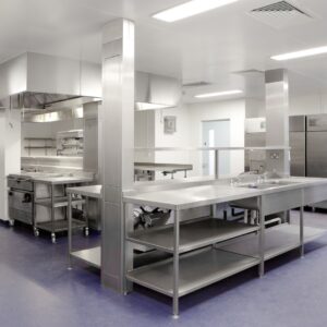 a commercial kitchen with stainless steel equipment