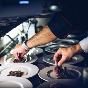 a person plating food