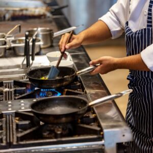 cooking in commercial kitchen