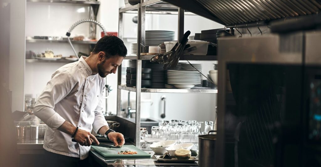 a man in a commercial kitchen
