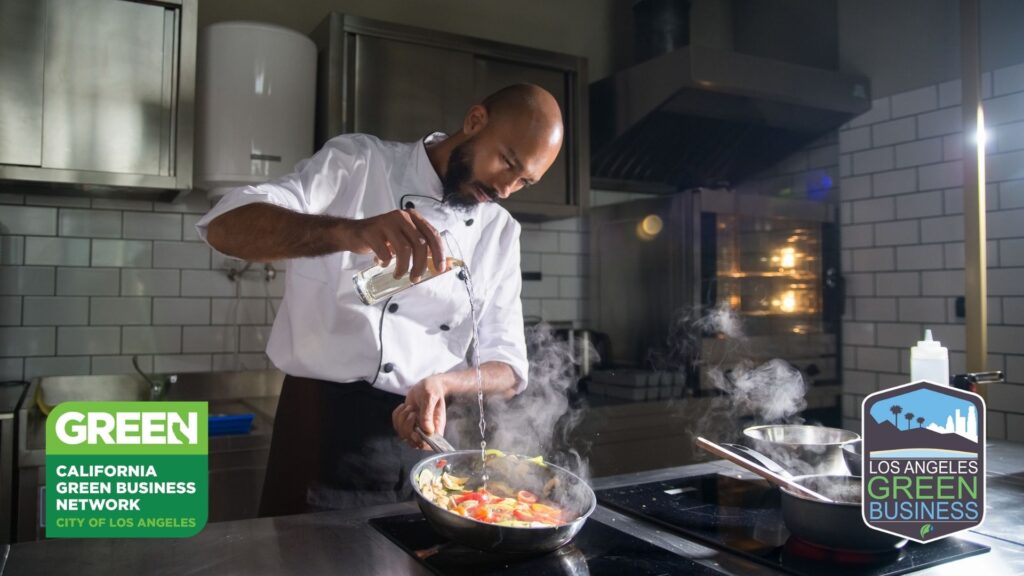 chef cooking with Green Business badges
